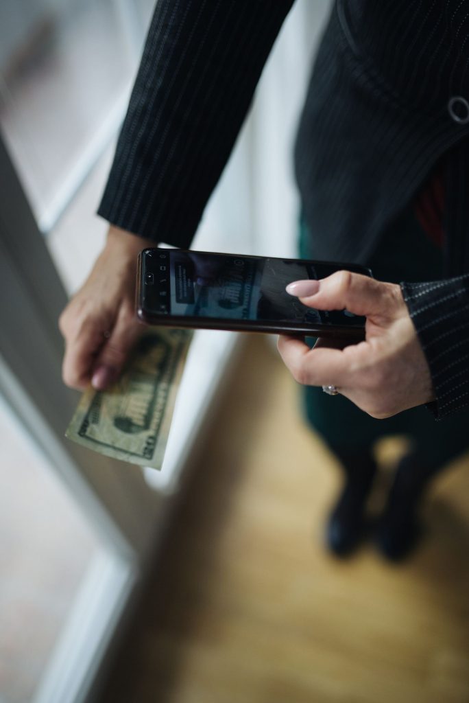 person using crypto wallet on phone